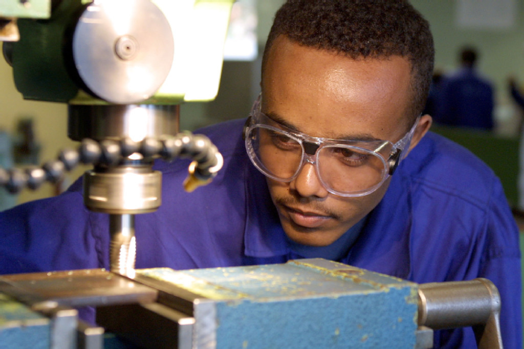 Employee working with material